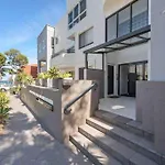 Beautiful, Modern Apartment Seconds From Beach