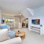 Beautiful, Modern Apartment Seconds From Beach